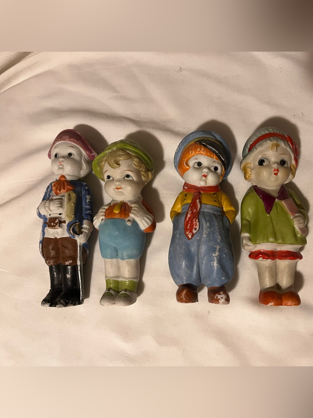4 Porcelain Bisque Antique Japan Dolls. All 1920’s. Very Good condition.